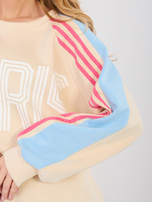 Pastelowy niebieski komplet z szerokimi spodniami