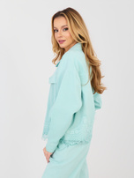 Miętowa jeansowa kurtka z imitacją kieszeni RUE PARIS  