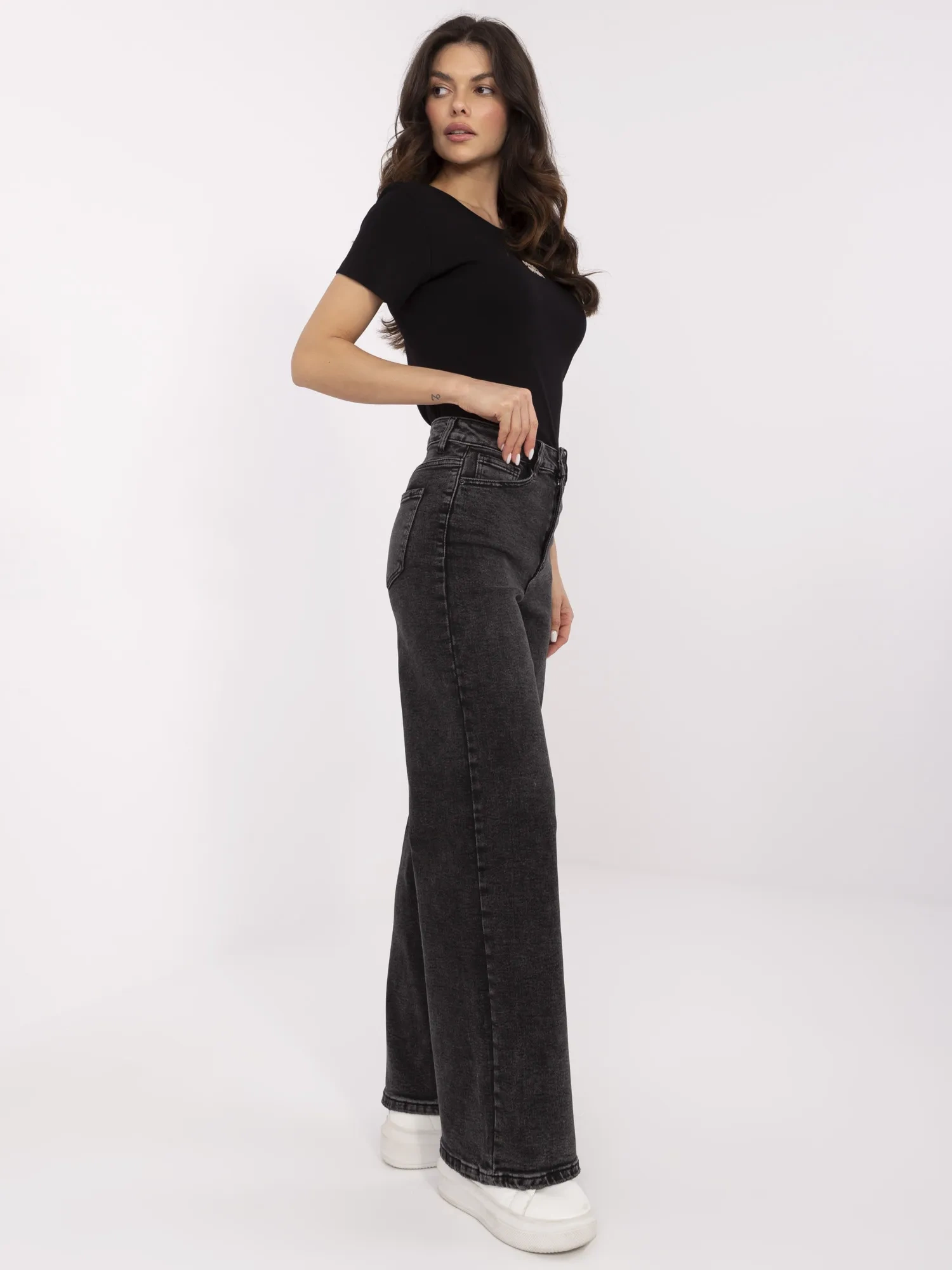 Dark gray long dad fit jeans with straight legs.