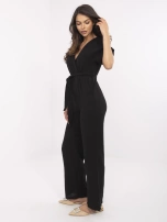 Black muslin jumpsuit with pockets.