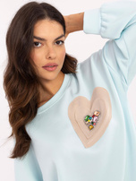Hurtownia Jasnoniebieska bluza oversize bez kaptura