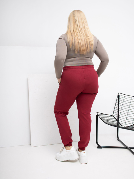 Bordowe dresowe spodnie plus size z kieszeniami