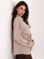 Beżowa koszula z ozdobnymi guzikami