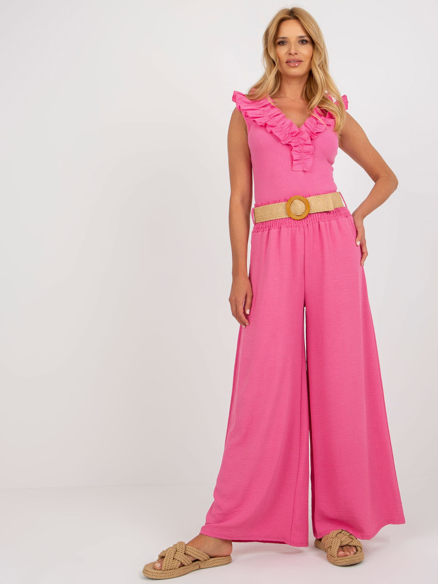Różowe spodnie z materiału palazzo high waist