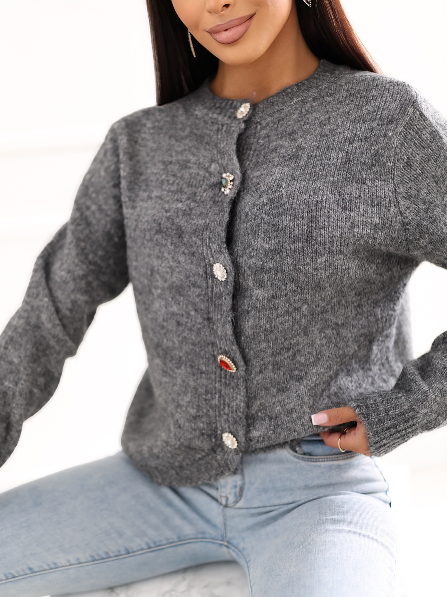 Dark gray fluffy cardigan with jewelry buttons.