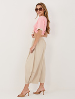 Beżowe sztruksowe spodnie z zakładkami