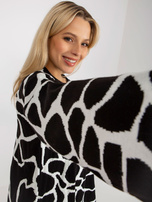 Online-Großhandel Schwarz-weißer gemusterter Oversize-Pullover.