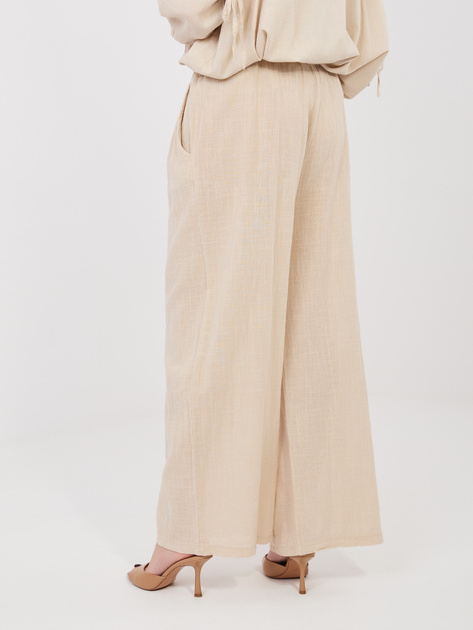 Beżowe letnie spodnie z kieszeniami