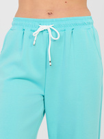 Turkusowe dresowe z prostą nogawką RUE PARIS