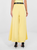 Pastelowe żółte spodnie z szeroką nogawką RUE PARIS 