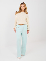 Pastelowy sweter z wiązaniami przy rękawach
