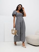 Black off-the-shoulder dress with a ruffle.