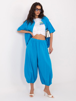 Niebieskie sztruksowe spodnie parachute z nogawką 7/8 