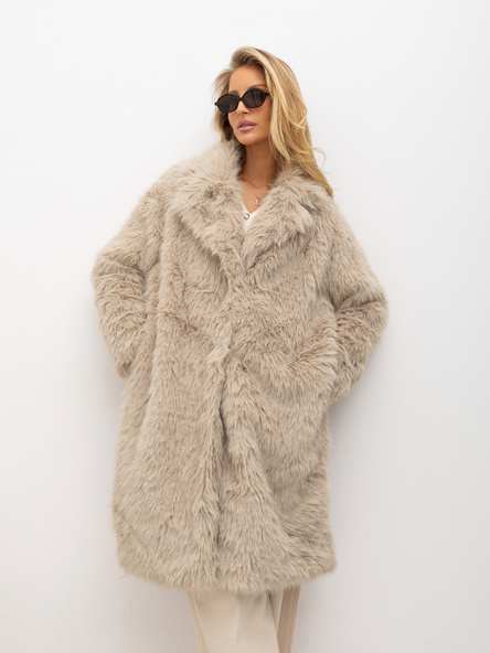Beige women's fur with long hair.