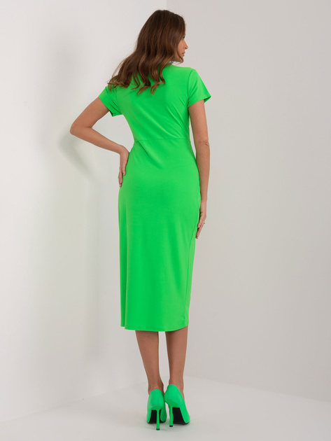 Hurtownia Jasnozielona dopasowana sukienka damska