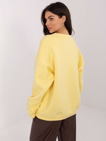 Żółta damska bluza z okrągłym dekoltem