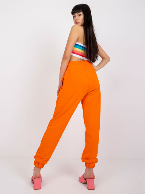 Pomarańczowe spodnie dresowe z kieszeniami RUE PARIS
