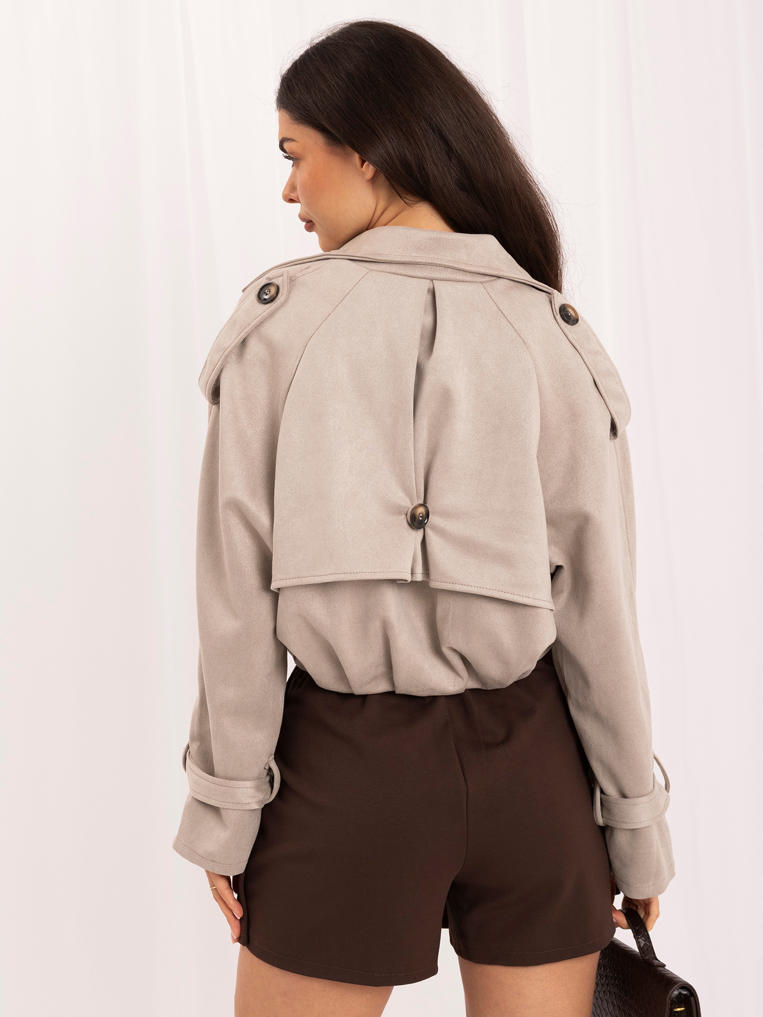 Light gray suede-like jacket with a collar.