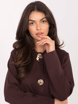 Chocolate elegant sweater with snap fasteners.