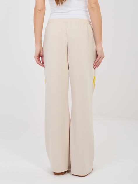 Beżowe dresowe spodnie z kontrastowymi lampasami RUE PARIS