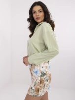 Pistacjowa damska koszula o luźnym kroju