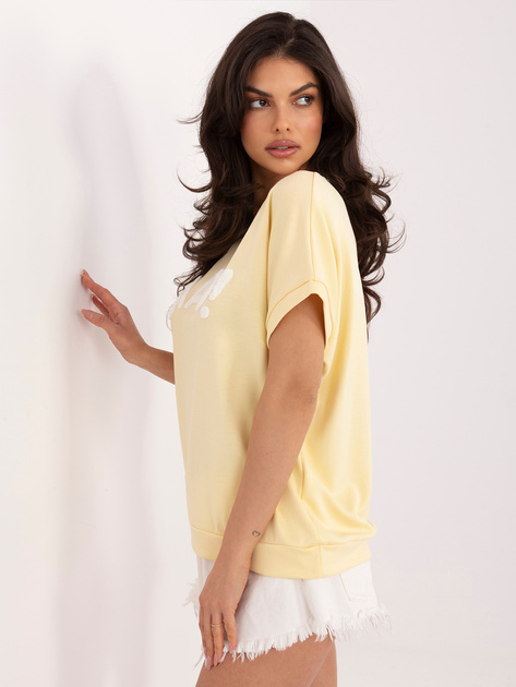 Jasnożółta bluzka z kontrastowym napisem RUE PARIS