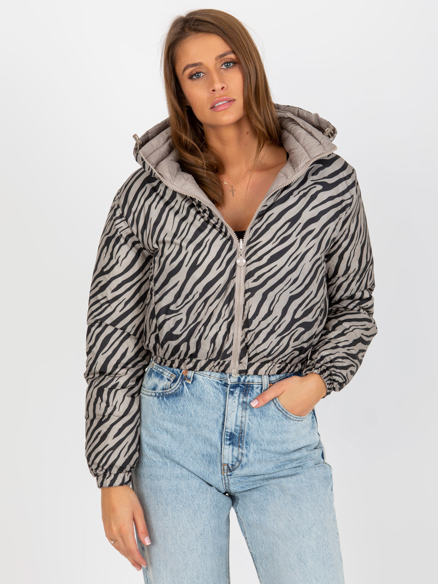 Hurt Dunkelbeige beidseitig gepolsterte Jacke im Tiermuster.