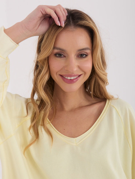 Jasnożółta bluzka oversize z bufiastym rękawem