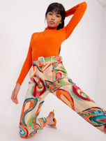 Hurt Beżowe damskie spodnie z materiału z printem