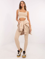 Beige three-piece set with a warm hoodie.