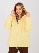 Pastelowa żółta pikowana kurtka z kieszeniami 
