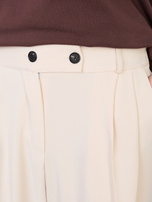 Jasnobeżowe garniturowe spodnie z zakładkami RUE PARIS 