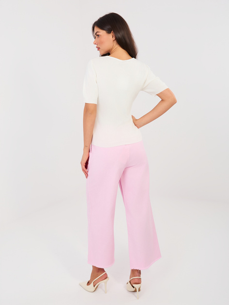 Jasnoróżowe jeansowe spodnie od kompletu