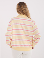 Light yellow oversized striped sweatshirt.