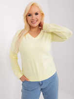 Wholesale bright yellow plus size blouse with patch.