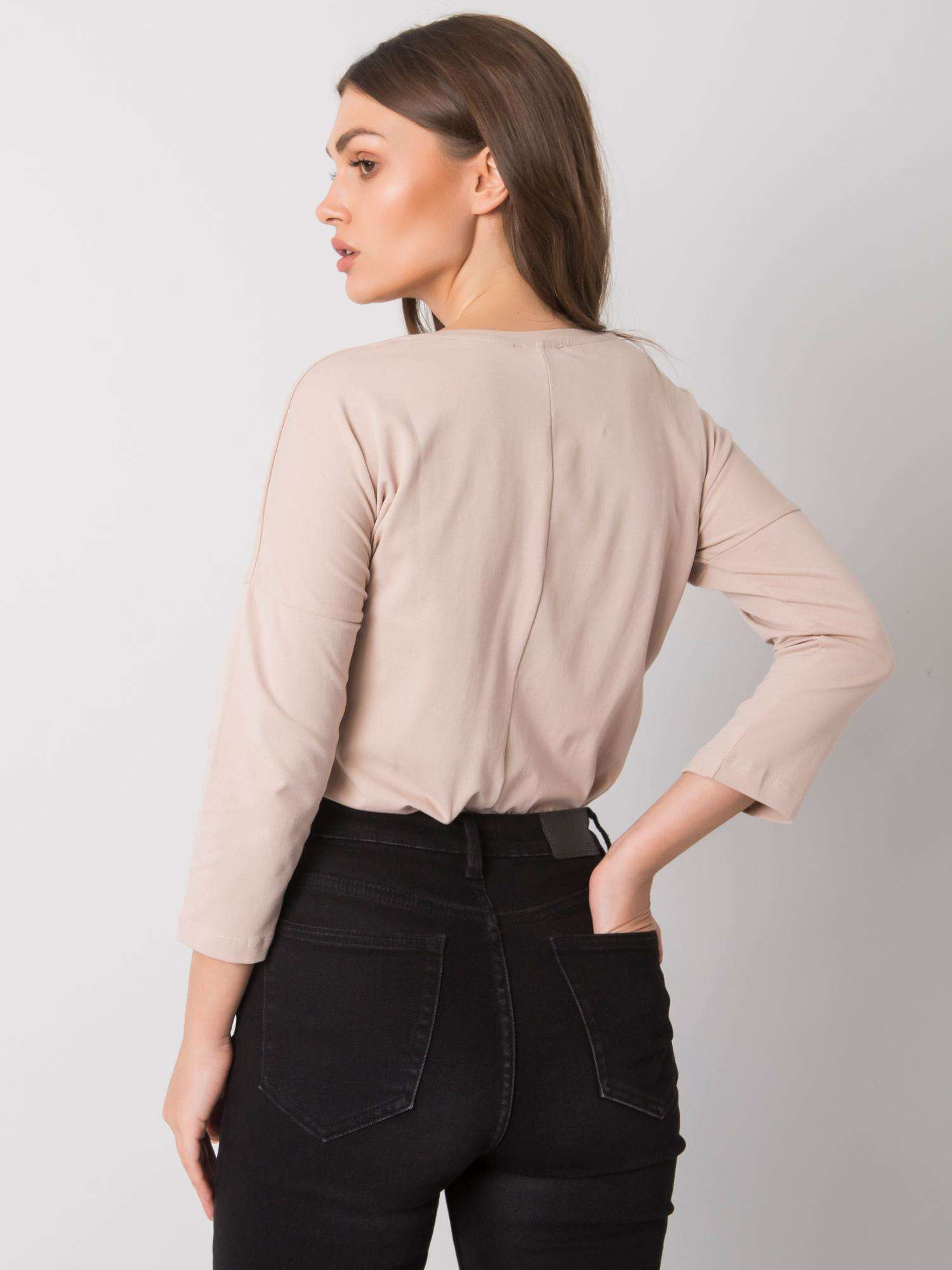 Helle beige Baumwollbluse mit dem Aufdruck Cantrice.