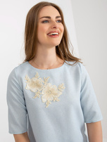 Hurt Jasnoniebieska damska bluzka wizytowa z koronką