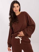 Brązowe błyszczące spodnie od kompletu