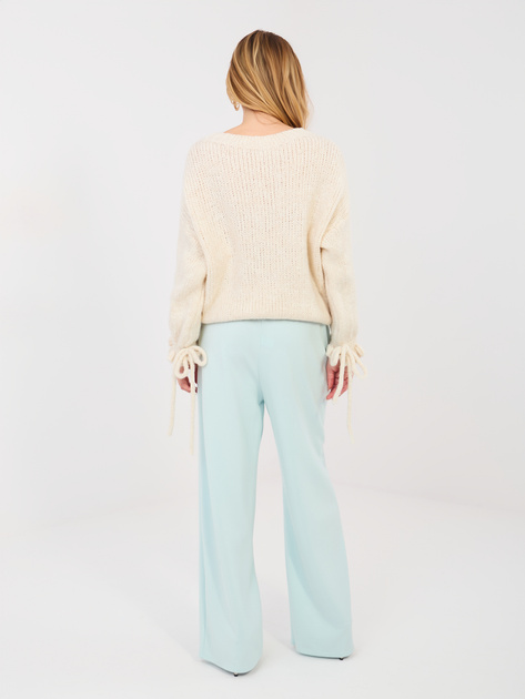 Pastelowe miętowe dresowe spodnie z paskiem RUE PARIS