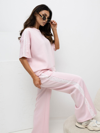 Jasnoróżowe dresowe spodnie z wiązaniem