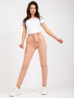 Beżowe spodnie z materiału z kieszeniami RUE PARIS