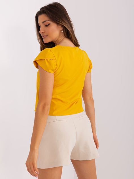 Hurtownia Ciemnożółta damska bluzka wizytowa