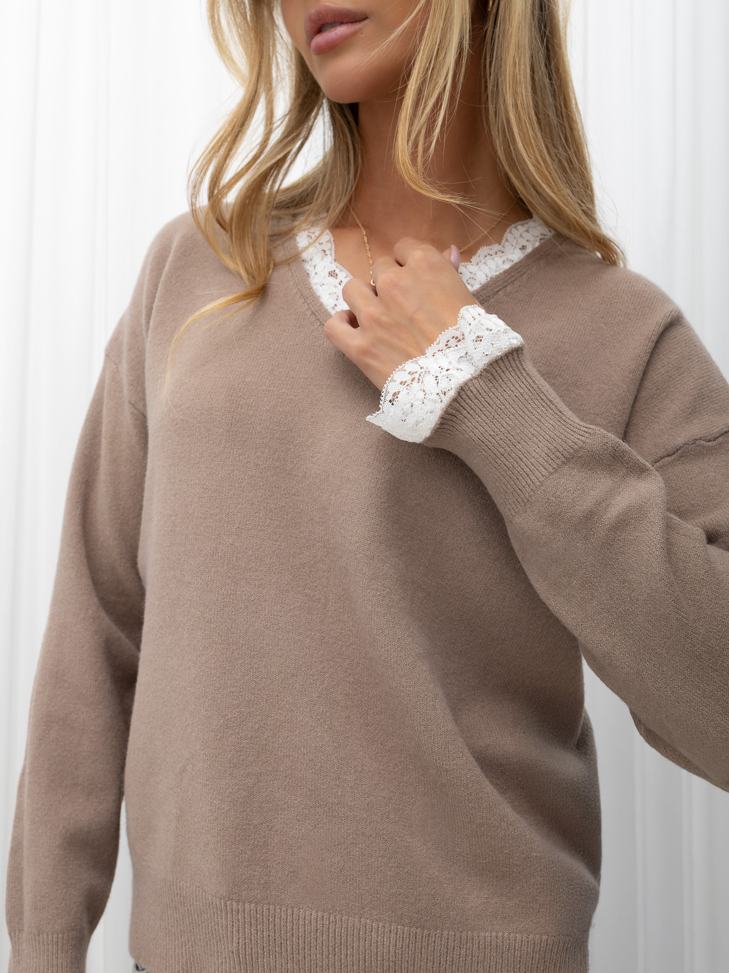 Dark beige elegant V-neck sweater.