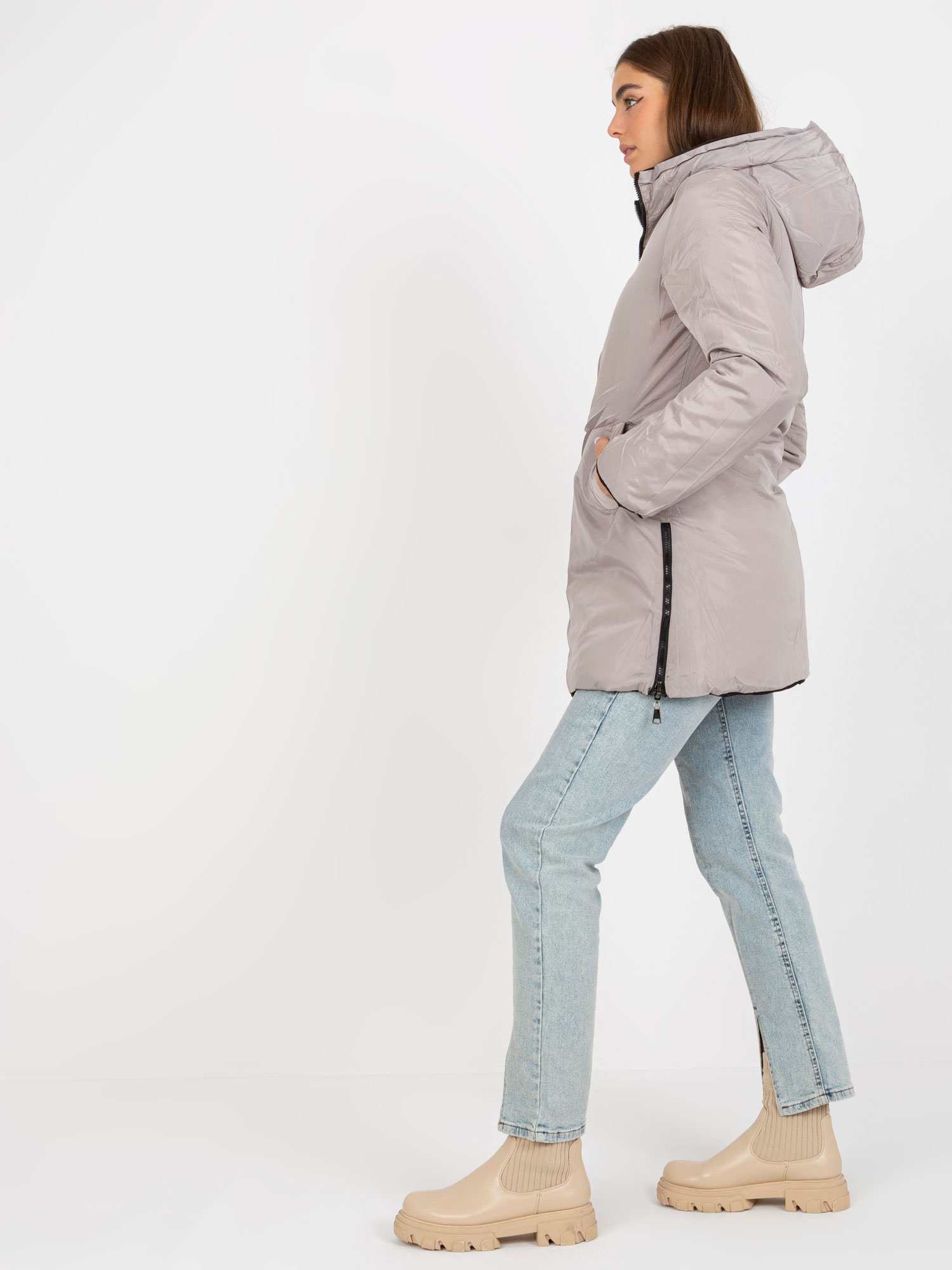 Hurt schwarz-beige wendbare Winterjacke mit Kapuze.