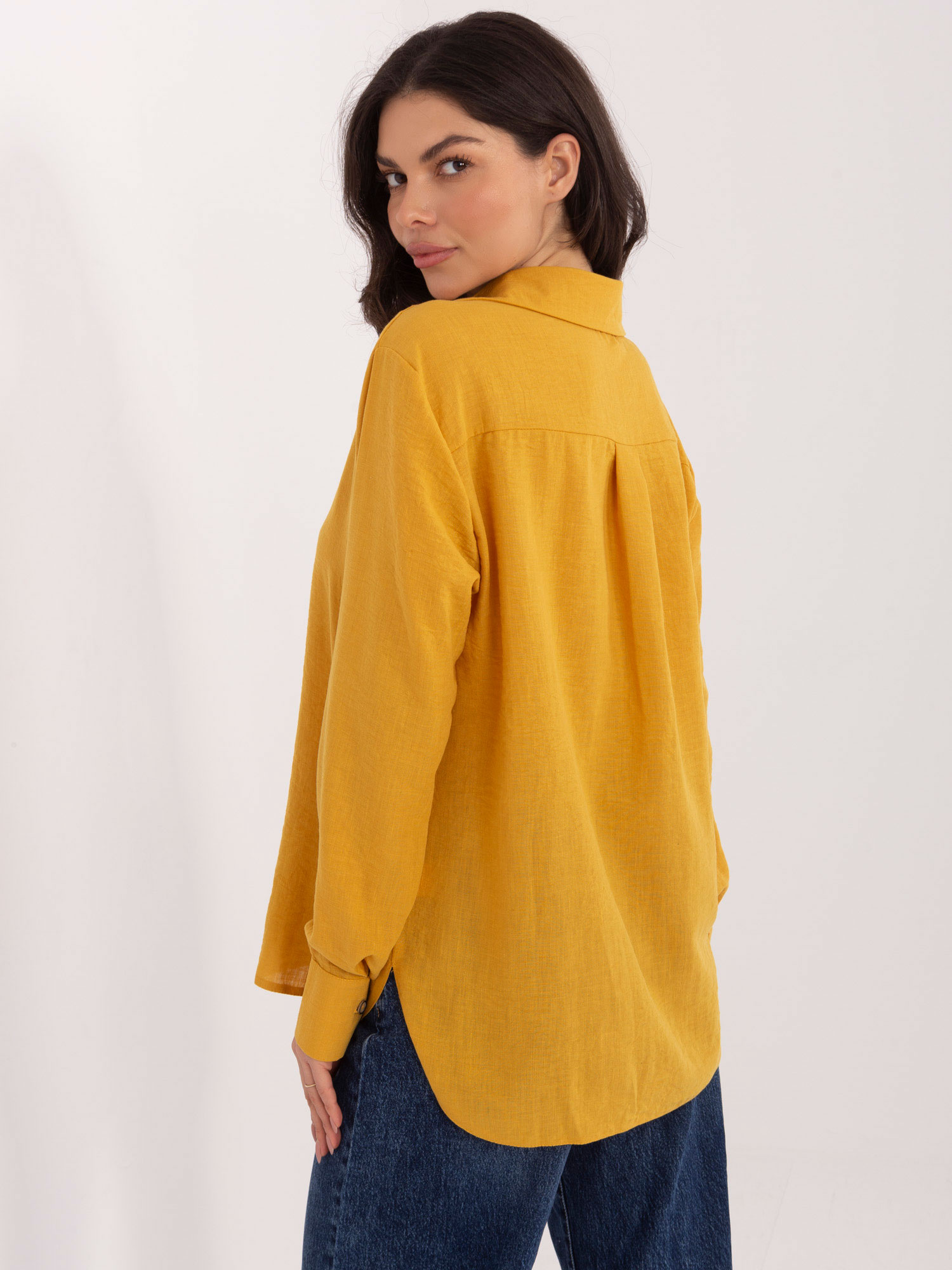 Dark yellow women's long-sleeve shirt.