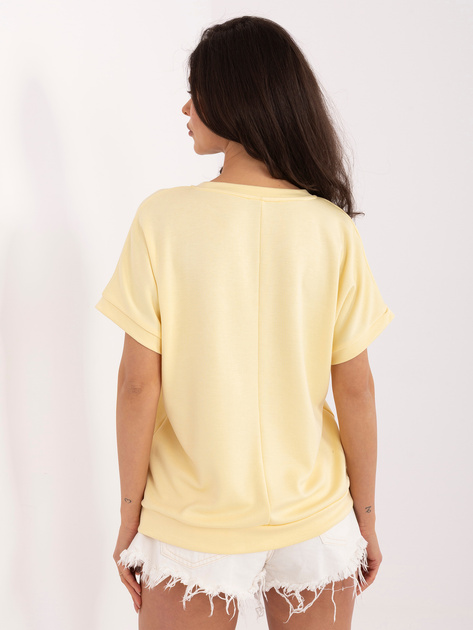 Jasnożółta bluzka z kontrastowym napisem RUE PARIS