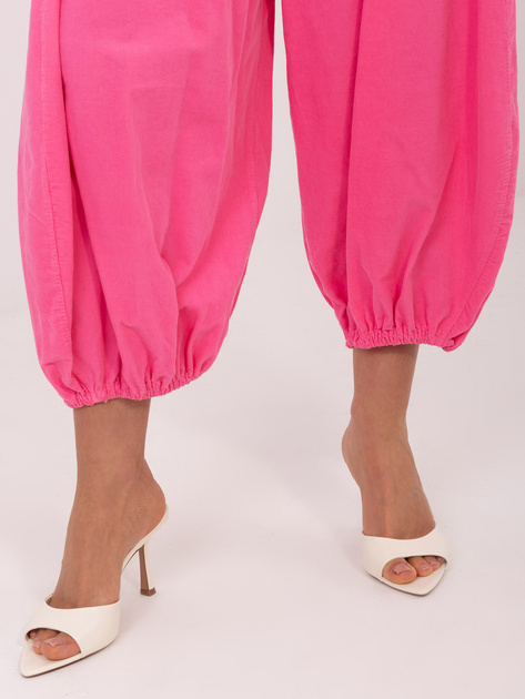 Ciemnoróżowe sztruksowe spodnie z baloniastymi nogawkami