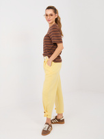 Jasnożółte dresowe spodnie z nogawką 7/8