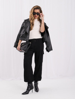 Black corduroy pants with side pockets.