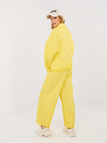 Żółte jeansowe spodnie z koronką RUE PARIS 